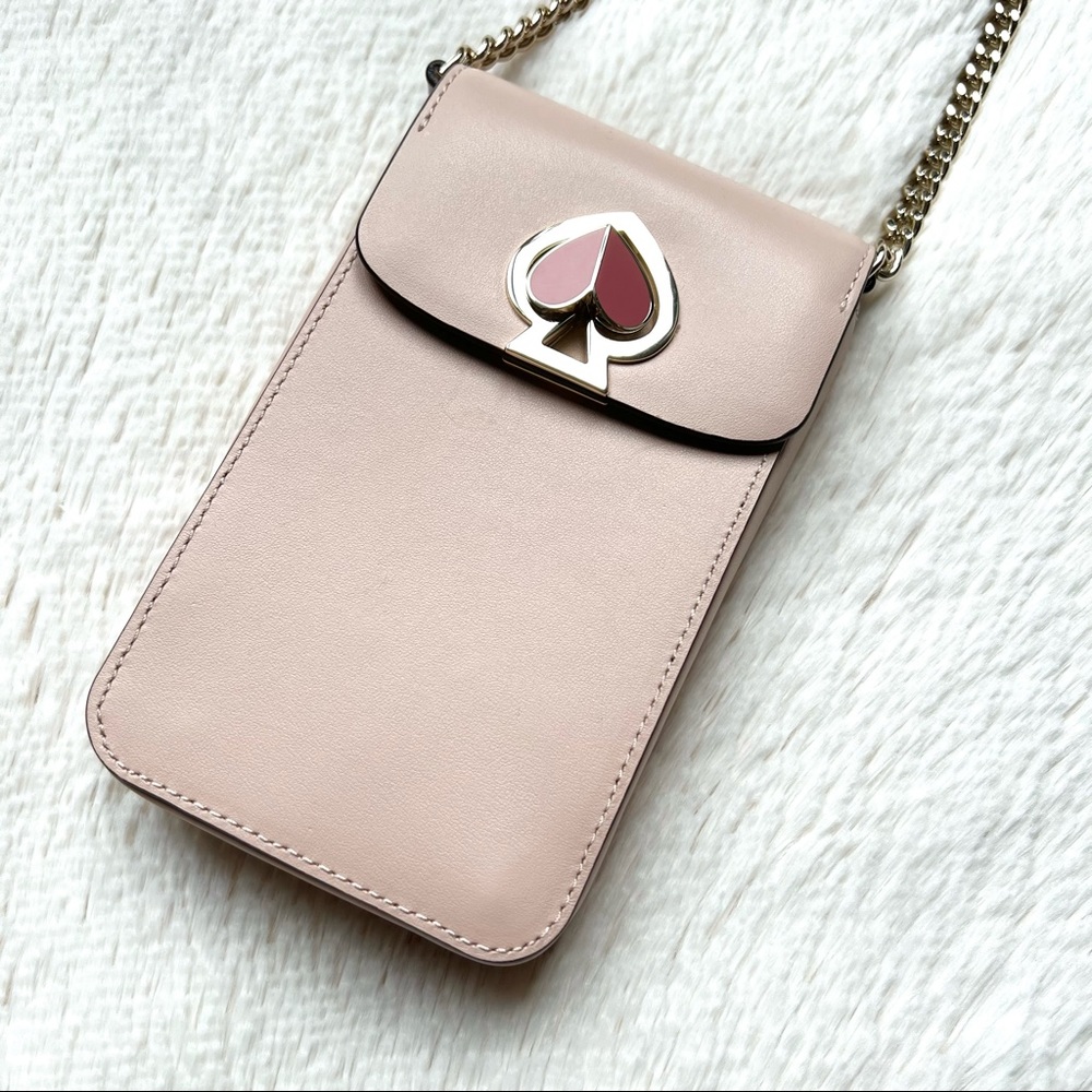 Kate Spade Nicola North South turn lock phone crossbody in blush / pink leather